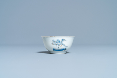 Een Chinese blauw-witte kop en schotel met decor naar Cornelis Pronk, Yongzheng/Qianlong