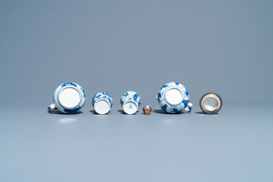 Two Chinese blue and white ewers and covers and two small vases, Kangxi