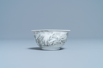 A Chinese grisaille cup and saucer with European hunters, Yongzheng