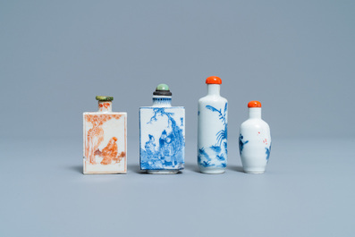 Four Chinese blue and white and iron-red snuff bottles, 19/20th C.