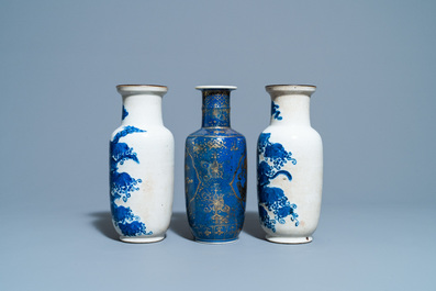 A pair of Chinese blue and white crackle-glazed rouleau vases and a gilt-decorated powder blue vase, 19th C.