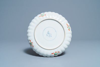 A lobed Chinese famille verte dish with a boy, Kangxi