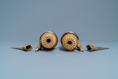 A pair of Tibetan silver and gilt copper alloy 'duomuhu' ewers, 19th C.