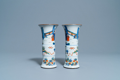 A pair of Chinese wucai 'gu' vases, 19th C.
