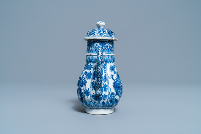 A tall Chinese blue and white teapot and cover, Kangxi