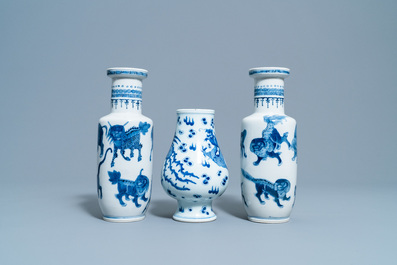 A pair of Chinese blue and white 'mythical beasts' vases and a pear-shaped 'dragon and phoenix' vase, 19th C.