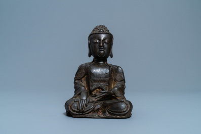 A Chinese bronze figure of Buddha, Ming