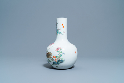 A Chinese famille rose bottle vase with quails, Qianlong mark, 19th C.