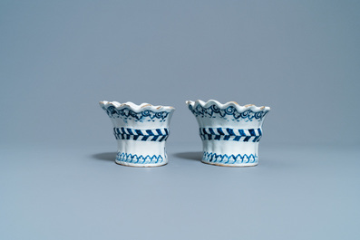 A pair of blue and white French faience bouqueti&egrave;res or wall flower holders, Lille, 18th C.
