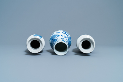 A pair of Chinese blue and white 'mythical beasts' vases and a pear-shaped 'dragon and phoenix' vase, 19th C.