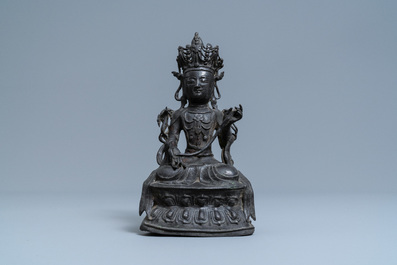 A Chinese bronze figure of Buddha, Ming