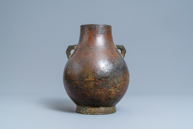 A Chinese copper-inlaid bronze 'hu' vase, Ming