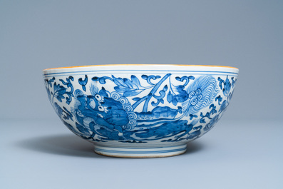 A large Chinese blue and white 'Buddhist lion' bowl, Transitional period