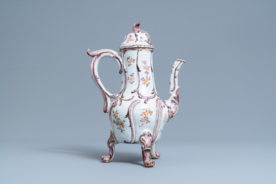 A tall polychrome Dutch Delft coffee pot and cover, 18th C.