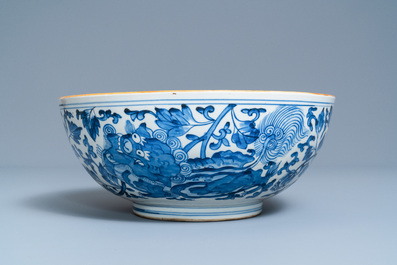 A large Chinese blue and white 'Buddhist lion' bowl, Transitional period