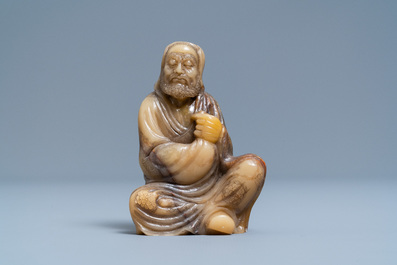 A Chinese Shoushan soapstone figure of a bearded elder, 18th C.