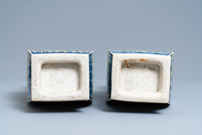 A pair of Chinese blue and white yellow-ground vases, 19th C.