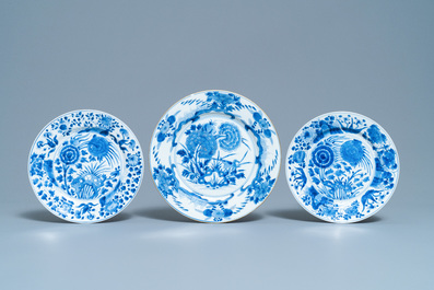 Eight Chinese blue and white plates with birds among blossoms, Kangxi