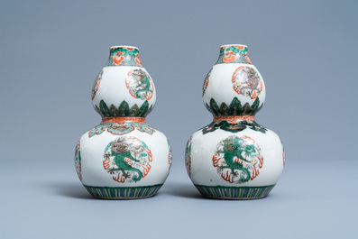 A pair of Chinese famille verte double gourd 'dragon' vases, 19th C.