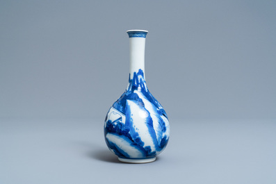 A Chinese blue and white bottle vase with riders on horseback, Kangxi