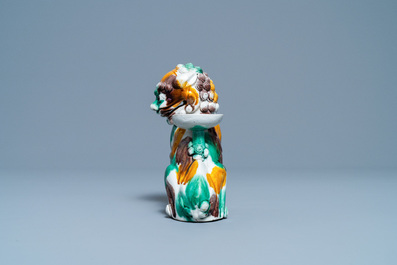 A Chinese sancai-glazed biscuit Buddhist lion joss stick holder, Kangxi
