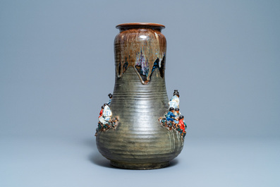 A tall Japanese Sumida Gawa vase with applied design of children and monkeys, Meiji, 19/20th C.