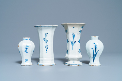 A varied collection of blue and white Dutch Delft plates and vases, 18th C.