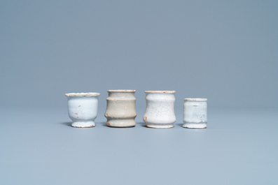 Nine white Dutch Delftware albarello-type ointment jars, 17/18th C.