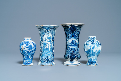 A varied collection of blue and white Dutch Delft plates and vases, 18th C.