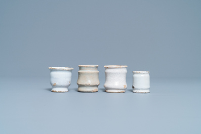 Nine white Dutch Delftware albarello-type ointment jars, 17/18th C.