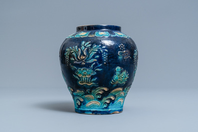 A Chinese fahua vase with mandarin ducks in a lotus pond, Ming