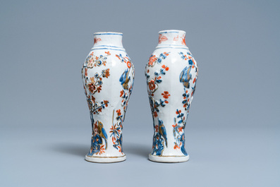 A Chinese famille verte dish and a pair of Imari-style relief-molded vases, Kangxi