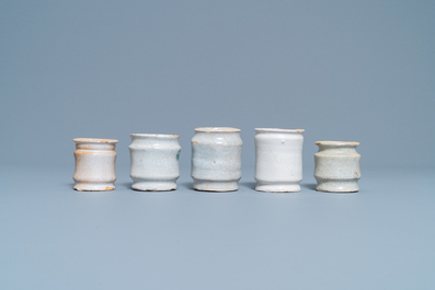 Nine white Dutch Delftware albarello-type ointment jars, 17/18th C.