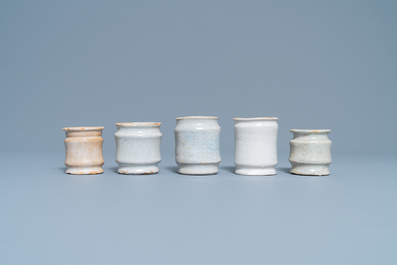 Nine white Dutch Delftware albarello-type ointment jars, 17/18th C.