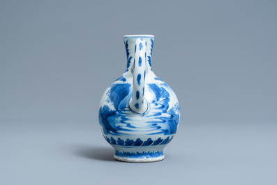 A Chinese blue and white ewer with figures in a landscape, Transitional period