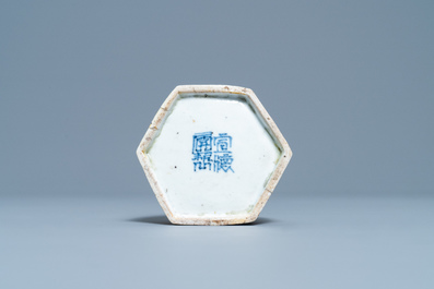 A Chinese hexagonal jaune biscuit brushwasher with applied aubergine-glazed dragon, Kangxi