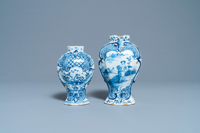 A varied collection of blue and white Dutch Delft plates and vases, 18th C.