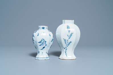 A varied collection of blue and white Dutch Delft plates and vases, 18th C.
