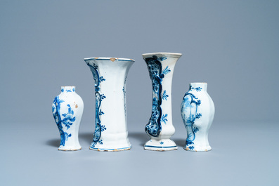 A varied collection of blue and white Dutch Delft plates and vases, 18th C.