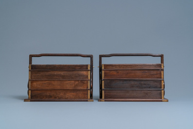 A pair of rectangular Chinese three-tiered hongmu wooden covered boxes, 19th C.