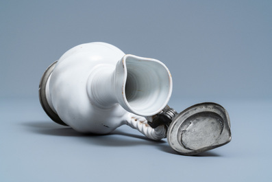 A pewter-mounted white Dutch Delftware jug, 17th C.