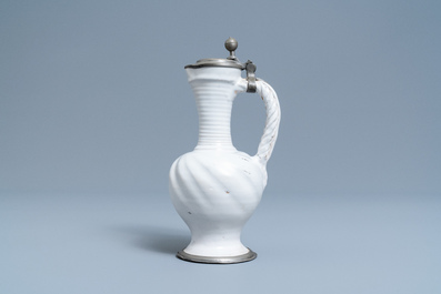 A pewter-mounted white Dutch Delftware jug, 17th C.