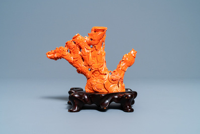 A Chinese carved red coral 'immortal' group, 19/20th C.