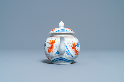 A Chinese 'crane and carps' teapot and cover, Yongzheng