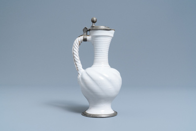 A pewter-mounted white Dutch Delftware jug, 17th C.