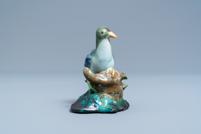 A polychrome Brussels faience model of a seated pigeon, 18th C.