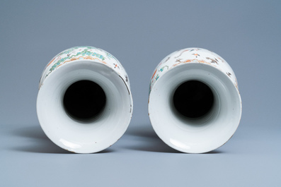A pair of Chinese famille rose 'phoenix' vases, Tongzhi mark and of the period