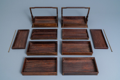 A pair of rectangular Chinese three-tiered hongmu wooden covered boxes, 19th C.