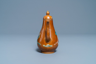 A Chinese famille rose capucin brown-ground ewer and cover, Yongzheng