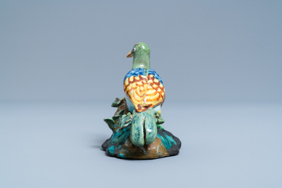 A polychrome Brussels faience model of a seated pigeon, 18th C.